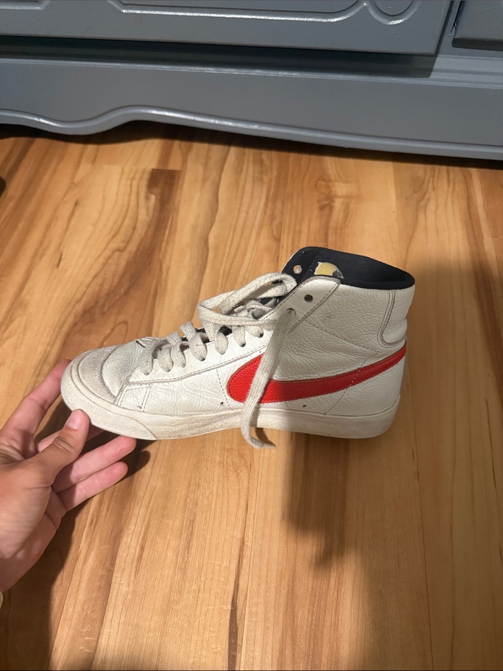 Nike Women’s High-Top Sneakers in Off-White with Red Swoosh
